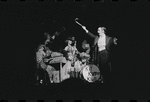 Joel Grey [right] and unidentified others in the stage production Cabaret