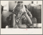 Child studying in school, Southeast Missouri Farms