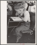 Child studying in school, Southeast Missouri Farms
