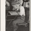 Child studying in school, Southeast Missouri Farms