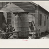 Outdoor cistern of house near River Road, near Destrehan, Louisiana. These open cisterns are a great breeding place for mosquitoes and are prevalent throughout southern Louisiana