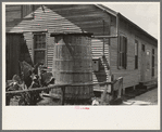 Outdoor cistern of house near River Road, near Destrehan, Louisiana. These open cisterns are a great breeding place for mosquitoes and are prevalent throughout southern Louisiana