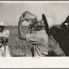 Rice farmer drinking in the fields, Crowley, Louisiana