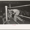 Second tending to boxer in corner of ring, Rayne, Louisiana