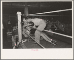 Second tending to boxer in corner of ring, Rayne, Louisiana
