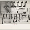 Patterns of tools painted on wall for easy identification, Lake Dick Project, Arkansas