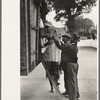 Helping women cotton pickers board truck, Pine Bluff, Arkansas