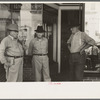 Farmers talking in front of old store, Crowley, Louisiana