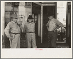 Farmers talking in front of old store, Crowley, Louisiana