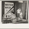 Decorating store window for National Rice Festival, Crowley, Louisiana