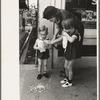 Mother with two children with popcorn, National Rice Festival, Crowley, Louisiana