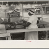 Paying for supplies delivered to concession, National Rice Festival, Crowley, Louisiana
