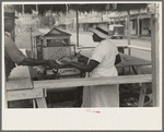 Paying for supplies delivered to concession, National Rice Festival, Crowley, Louisiana