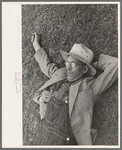 Farmer at National Rice Festival taking a rest, Crowley, Louisiana