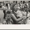 Farm mother with children in town during the National Rice Festival, Crowley, Louisiana