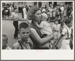 Farm mother with children in town during the National Rice Festival, Crowley, Louisiana