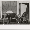 Group of tired people resting at state fair, Donaldsonville, Louisiana