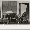 Group of tired people resting at state fair, Donaldsonville, Louisiana