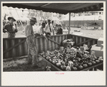 Tossing rings at objects in concessions, state fair, Donaldsonville, Louisiana