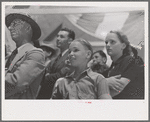 Group of people watching magician, state fair, Donaldsonville, Louisiana
