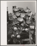 Display of headlights at junkyard, Abbeville, Louisiana