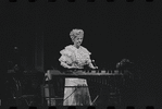 Dortha Duckworth playing the xylophone in a scene from the stage production Flora, the Red Menace