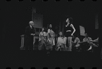 Joe E. Marks [left], Stephanie Hill [center] and ensemble in the stage production Flora, the Red