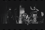 Joe E. Marks [center], Stephanie Hill [right] and ensemble in the stage production Flora, the Red