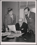 Producers Robert E. Griffith and Harold Prince with director George Abbott (seated)