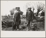 Negro laborers employed by Joseph La Blanc, wealthy Cajun farmer, Crowley, Louisiana, with possum and birds they shot