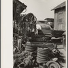 Fly wheels and speedometer cables in junkyard, Abbeville, Louisiana