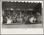 Concession with barker, state fair, Donaldsonville, Louisiana