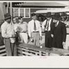 Baseball-throwing concession with man about ready to buy a throw, state fair, Donaldsonville, Louisiana