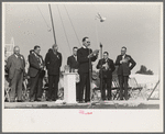 Chaplain praying from the main platform, opening the state fair, Donaldsonville, Louisiana