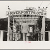 River pilot entering pilot's clubhouse, Pilottown, Louisiana