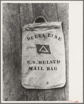 Mail bag on dock, Pilottown, Louisiana