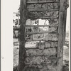 Detail of construction of old house; note the wooden cross lath. The construction material composed of mud and native moss. Near Edgard, Louisiana