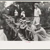 Residents at Boothville, Louisiana sitting on dock