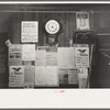 Posters and decorations in combined general store and post office, Olga, Louisiana