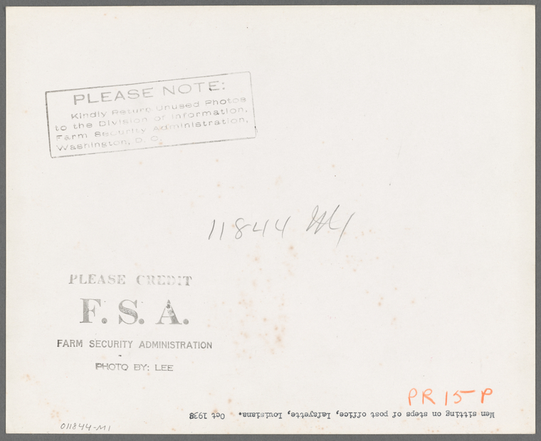 Men sitting on steps of post office, Lafayette, Louisiana NYPL