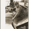 Ice being loaded into shrimp boat, Morgan City, Louisiana