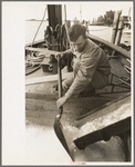 Ice being loaded into shrimp boat, Morgan City, Louisiana