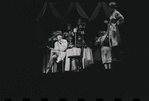 Tresha Kelly [on phone] and ensemble in the stage production Cabaret