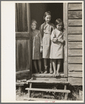 Children of day laborer in doorway of their home near New Iberia, Louisiana