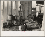 Laundry equipment and grain grinder on farm of Cajun sugarcane farmer near New Iberia, Louisiana