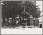 On All Saints' Day at New Roads, Louisiana Negroes assembeled in the church for preliminary ceremonies and then marched en masse to the cemetery for ceremonies there. Part of the group is shown entering the cemetery