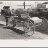 Spring wagon and horse with farmers' staples of coal, oil and flour, Laurel, Mississippi