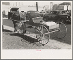 Spring wagon and horse with farmers' staples of coal, oil and flour, Laurel, Mississippi