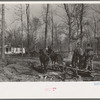 Mud sled arriving at home on project, Chicot Farms, Arkansas