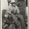 Mexican labor contractor in carrot field near Santa Maria, Texas